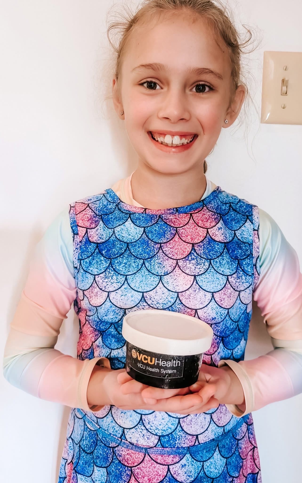 Child enjoying donated ice